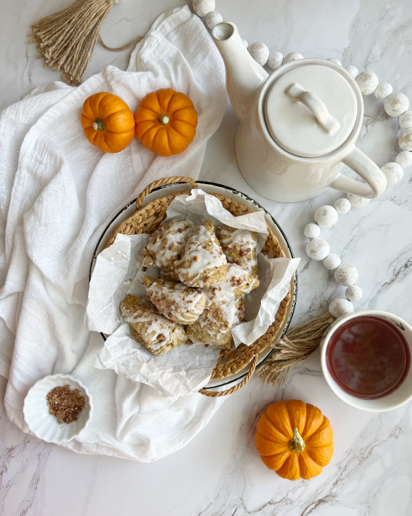 pumpkin scones flatlay with teapot and pumpkins