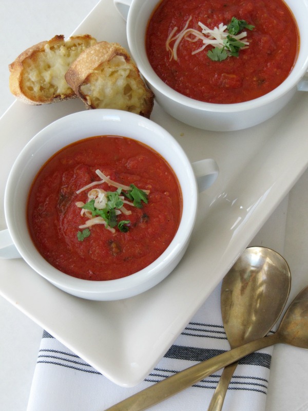 10 soups for fall and winter two white bowls filled with tomato soup on a white plate 