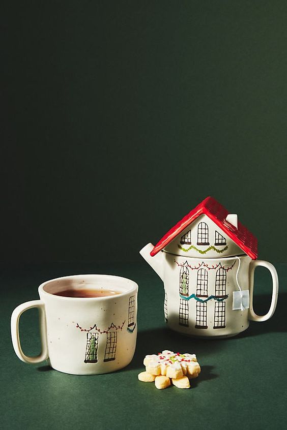 house shaped teapot and cup