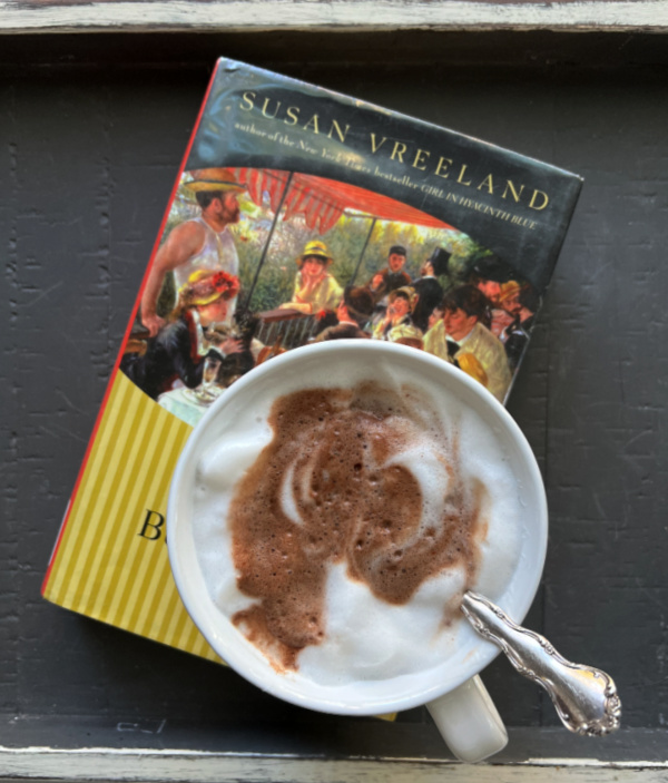 Monday musings Luncheon of the Boating PartyLuncheon of the Boating Party book cover with white cup of hot chocolate
