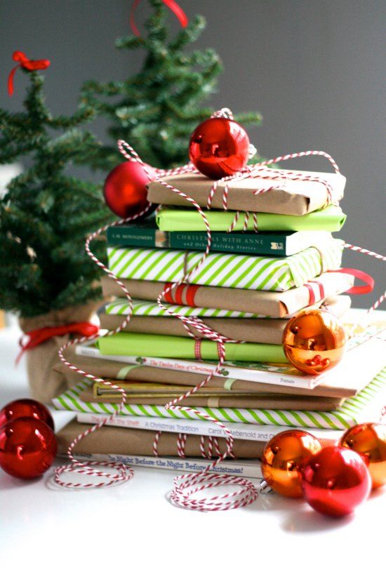 stack of red green and colorful packages with red bulbs