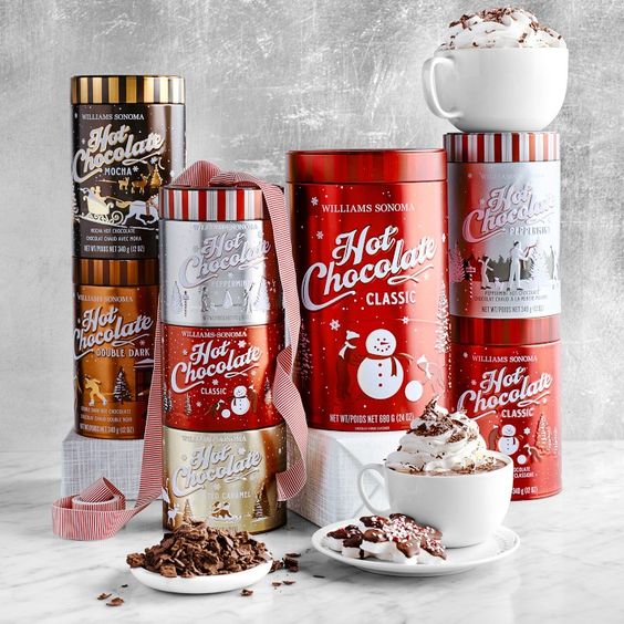 hot chocolate in cans and in cups with whipped cream