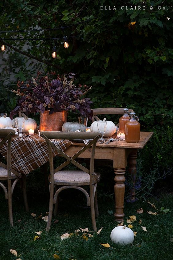 Fall table with a plaid blanket