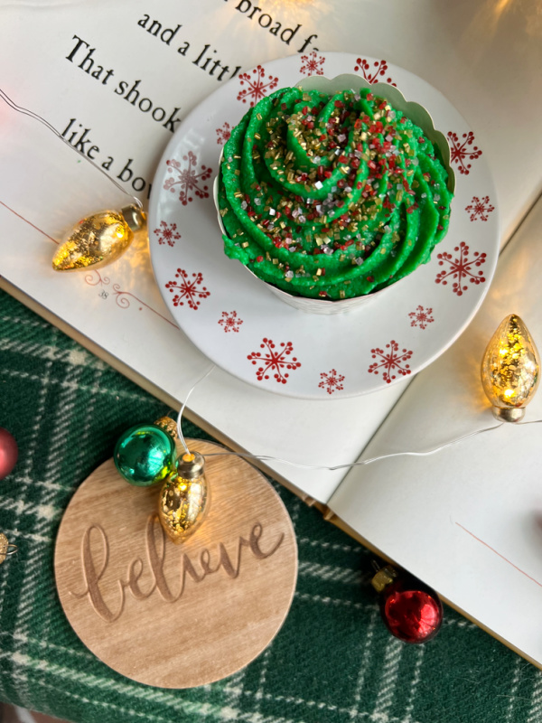 christmas cupcakes with sprinkles flatlay