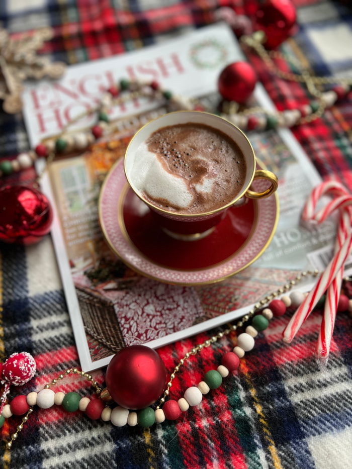 hot chocolate in an English tea cup with English home magazine