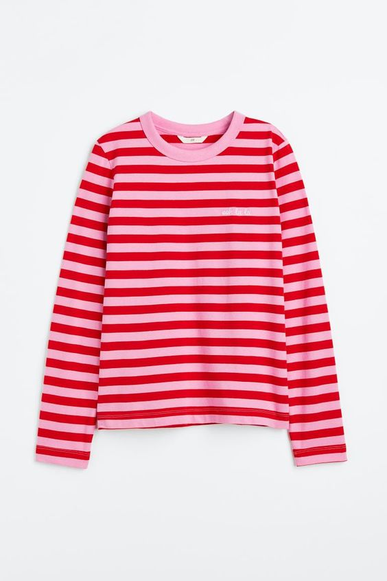 A pink and red striped sweatshirt. 
