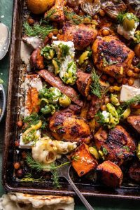 Sheet Pan Curry Butter Chicken with Sweet Potatoes and Tahini.