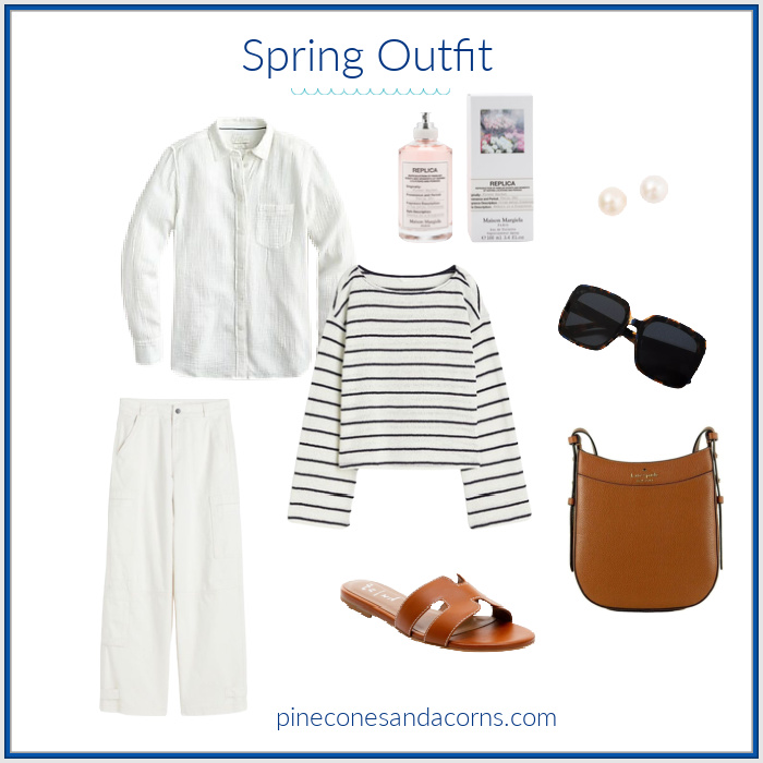 Spring outfit with stripe sweater, white shirt, and pants, along with brown sandals and purse.