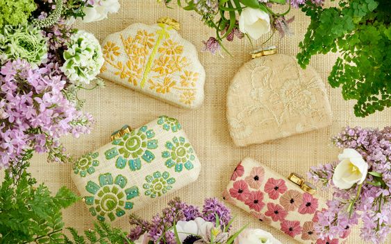 AERIN X PAMELA MUNSON handbag collage of straw bags with colorful flowers. 