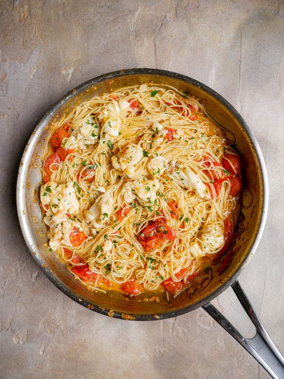Skillet of lobster pasta.