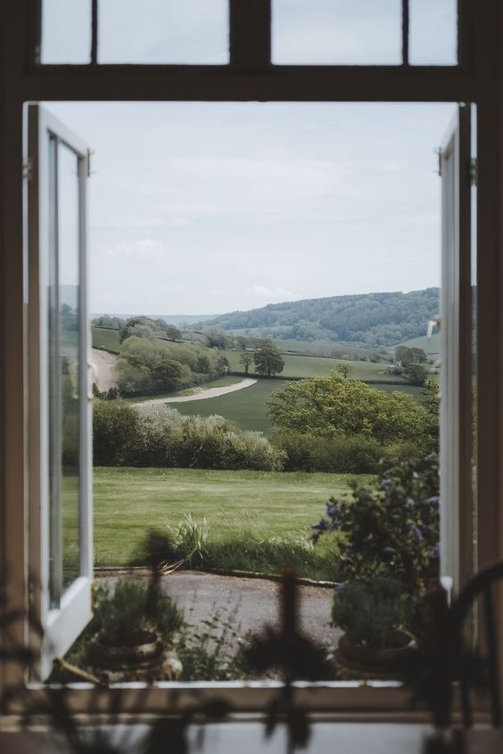 Glebe House, Devon a view out the window to the English countryside. 