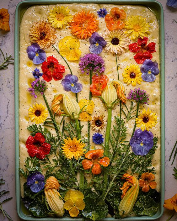 Must Love Herbs Focaccia bread decorated with flowers. 