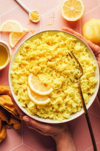 a large white bowl of lemon rice. 