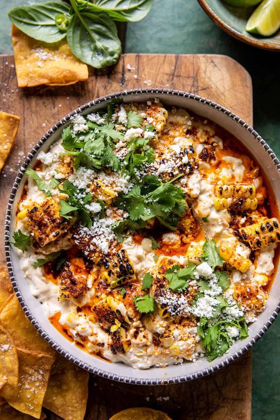 A large bowl of Mexican street corn dip.