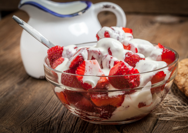 Wimbledon desserts, Fresh strawberries and cream in a bowl.