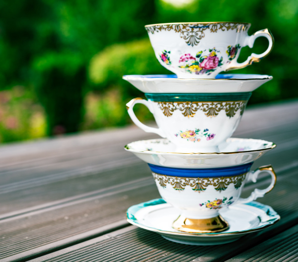 weekend meanderings vintage tea cups and saucers stacked.