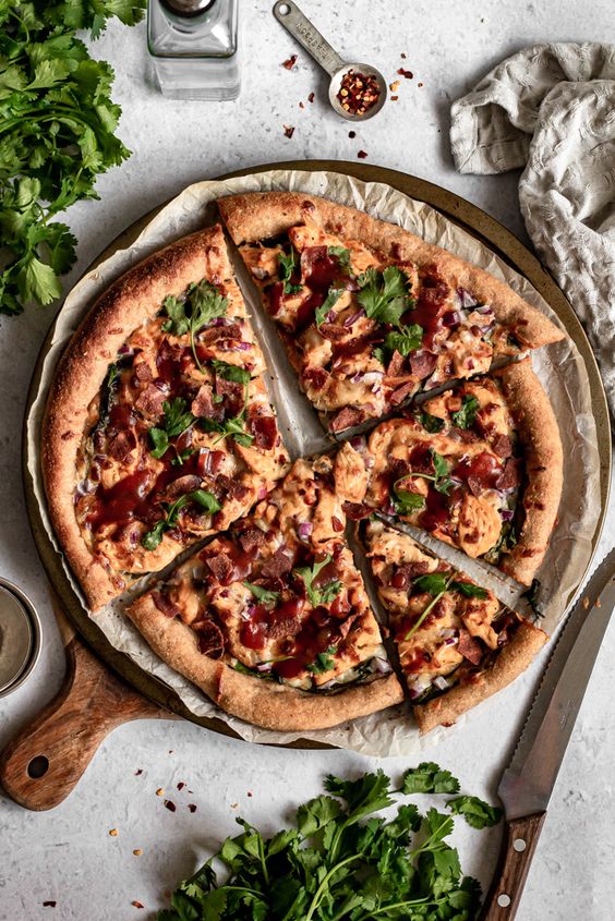 pizza on a wood board. 