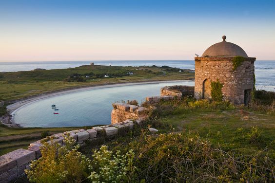 A fortress on an inlet on the Channel Islands.
