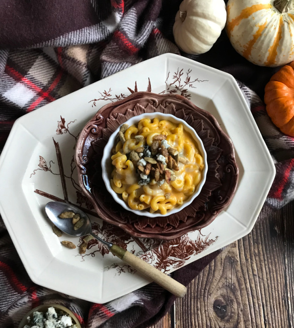 Pumpkin Mac and Cheese on a plaid blanket.