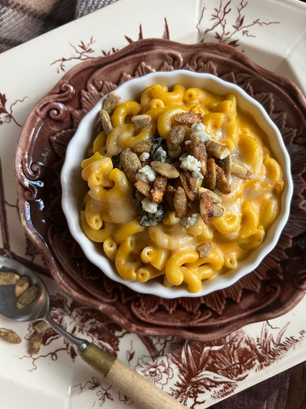 Pumpkin Mac and Cheese on brown and white transfer ware platter.