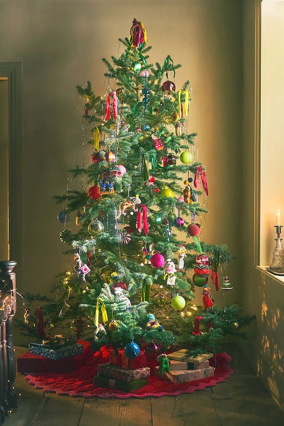 Christmas tree laden with colorful ornaments. 