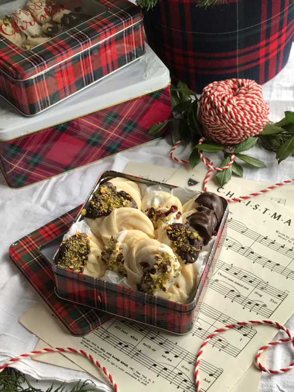 Viennese Whirl Cookies Biscuits in a plaid cookie tin.