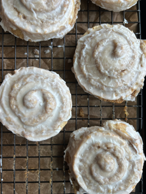 German Nut Rolls Nussschnecken on a baking rack.