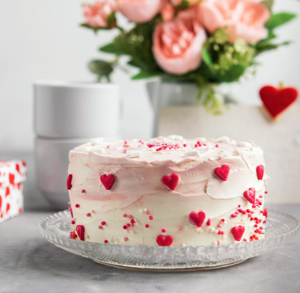 Valentine Cake and 2 white cups. 