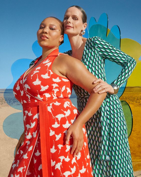 Diane von Furstenberg for Target, two ladies in colorful orange and green wrap dresses.