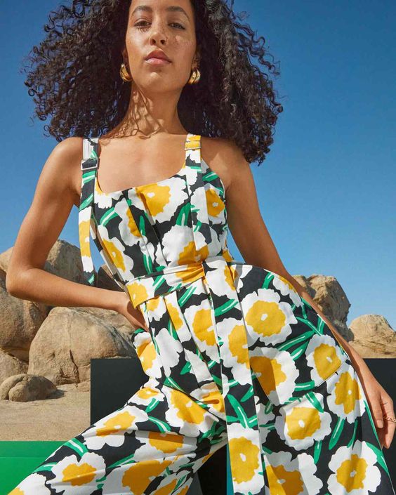 Diane von Furstenberg for Target, woman wearing a yellow, green and white jumpsuit.