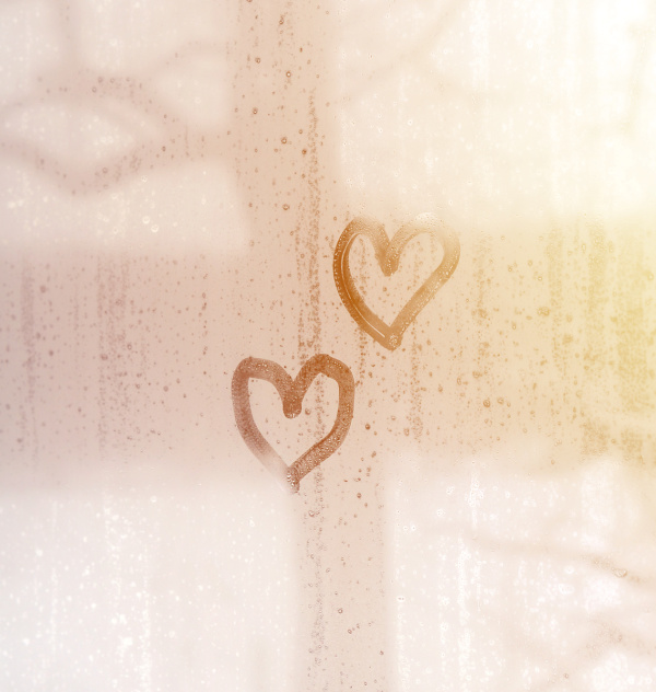 hearts drawn in the window on the condensation.