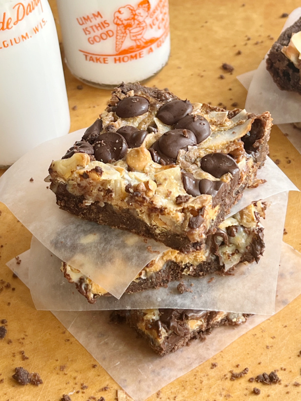 Ghirardelli Seven Layer Brownie Bar Recipe with a bottle of milk.