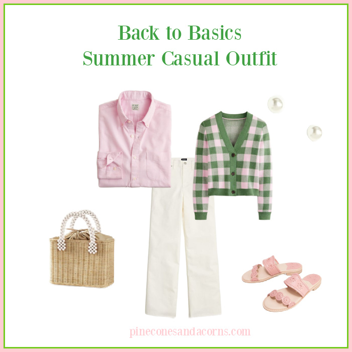 Fashion over 50 preppy casual outfit with white jeans, pink shirt and sandals, a white and wicker bag and a pair of pearl earrings.