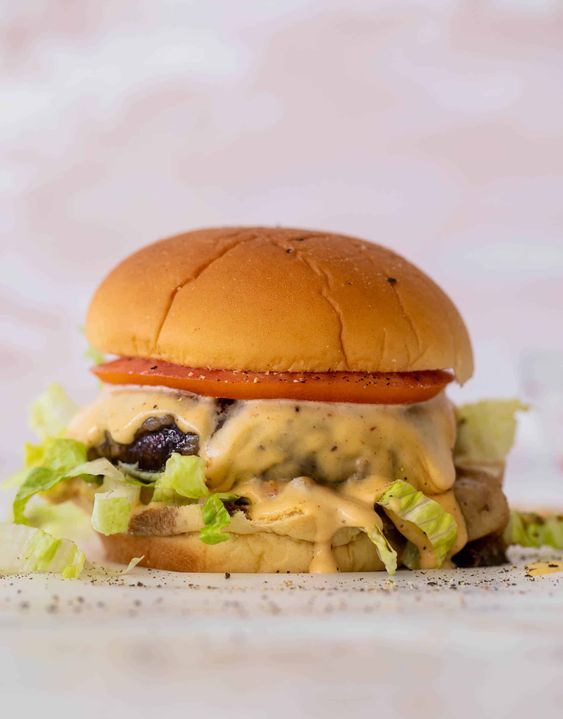 GRILLED PORTOBELLO BURGERS WITH HOUSE SAUCE.