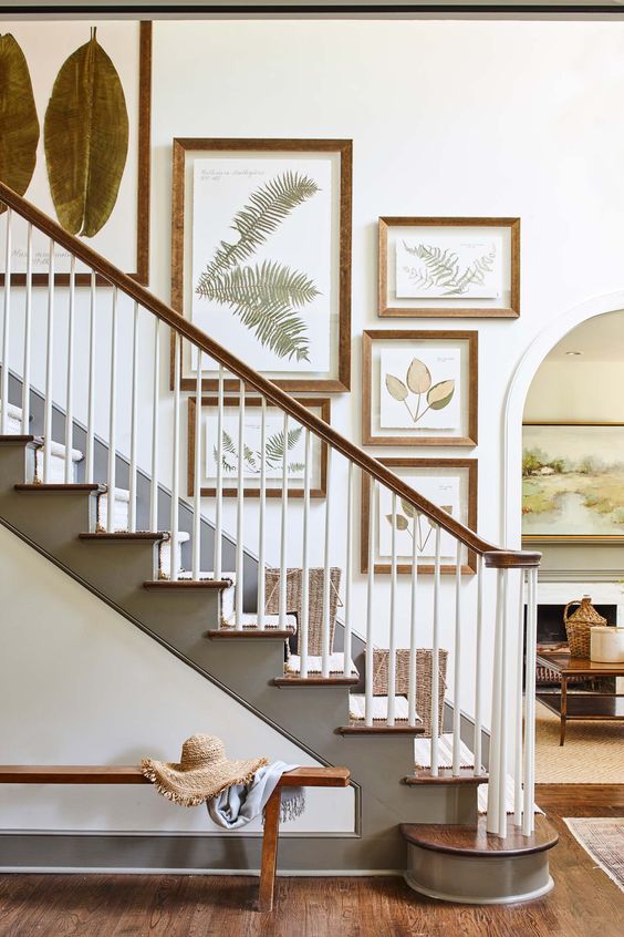 Ashley Gilbreath interiors, staircase with framed botanicl art.