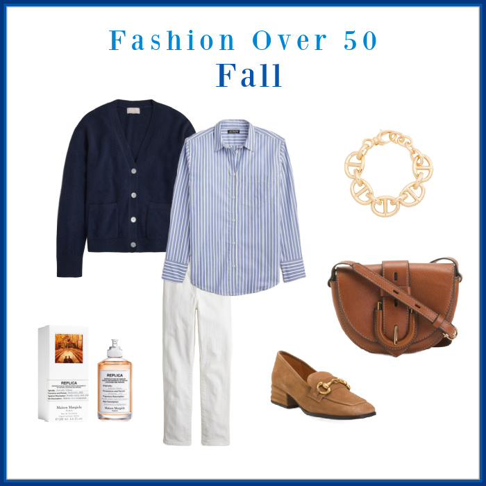 Fall fashion over 50, white jeans, blue and white stripe shirt, cable cardigan, tan purse and shoes and a gold bracelet.