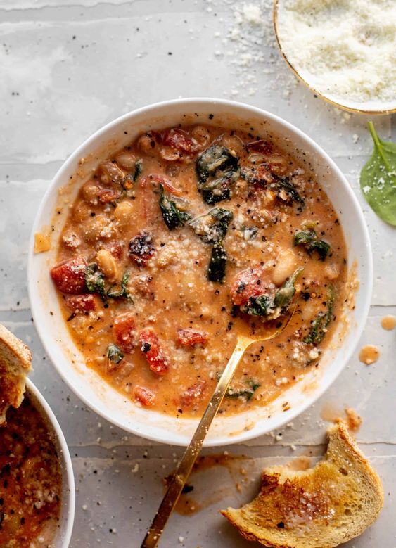 fire roasted white bean soup in a white bowl.
