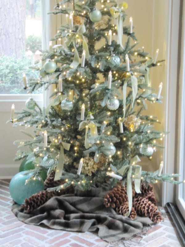 King of Christmas noble fir with sugar cones and large glass balls.
