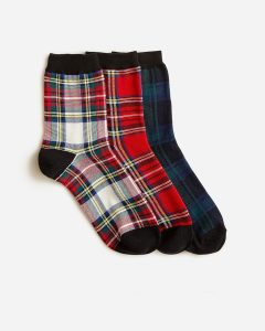Three pairs of tartan socks. 
