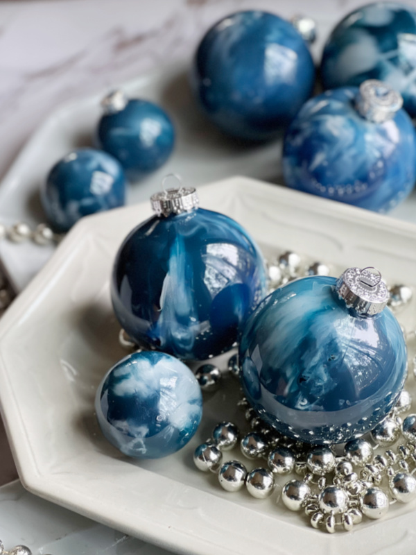 Marbled christmas ornaments on an ironstone platter