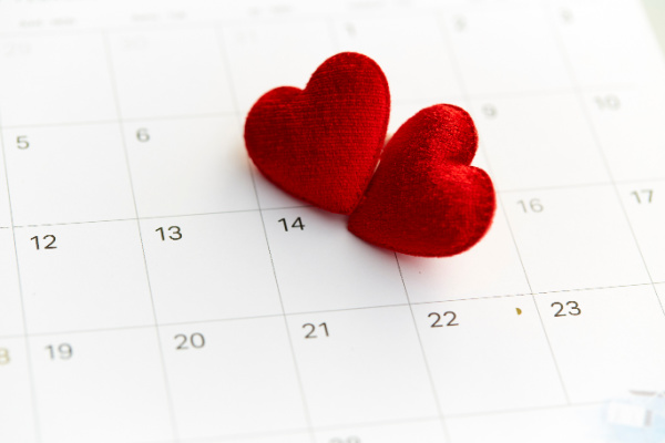 heart month graphic of calendar and two hearts.