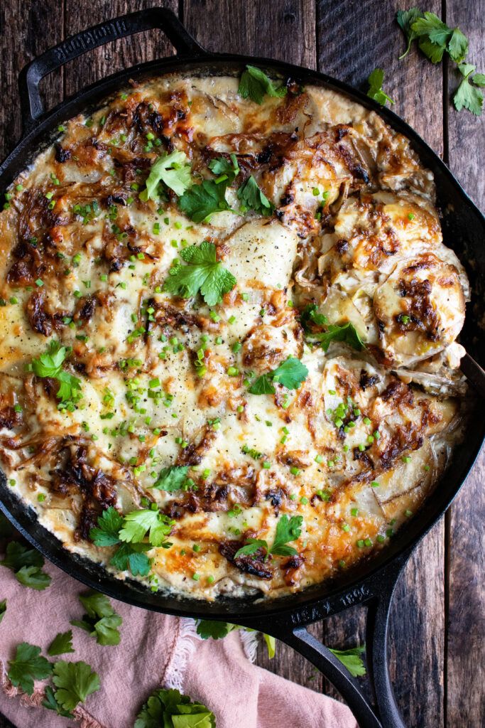 Irish scalloped potatoes in a skillet. 