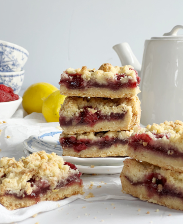 Raspberry Crumble Bars on a stack.