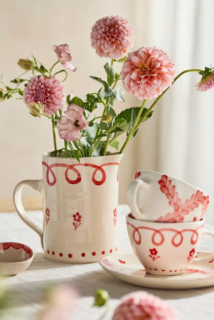 red and white coffee mugs and a red and white pitcher with flowers, summer hostess gifts. 