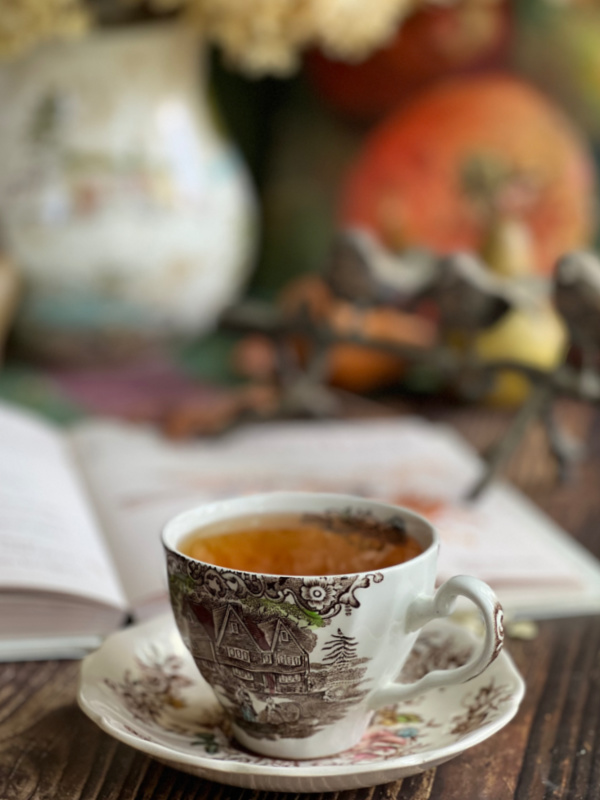 cup of tea in a brown and white transfer ware cup