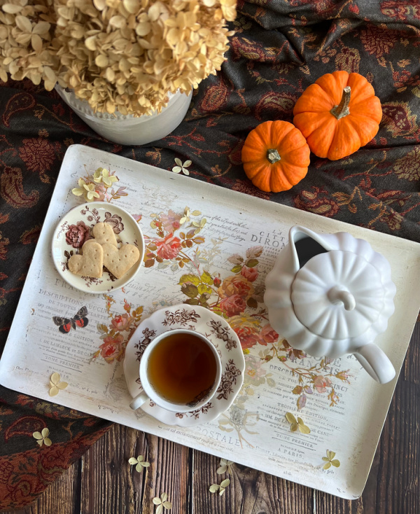 October Flatlay with pumpkins and tea pot.