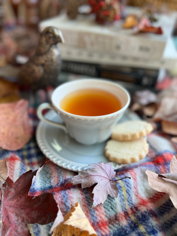 cup of tea and a stack of fall cookbooks.