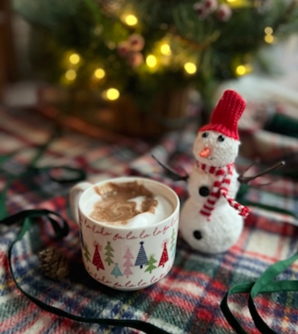 Cup of hot chocolate and a small snowman.